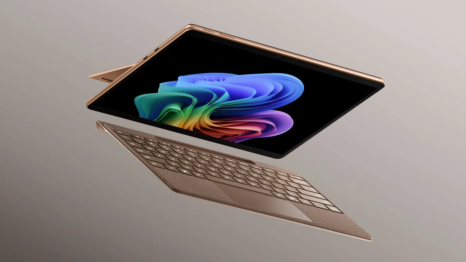 Surface Pro de 13 polegadas (12ª edição) na cor Dune, flutuando com a tela à mostra e o teclado destacado logo abaixo